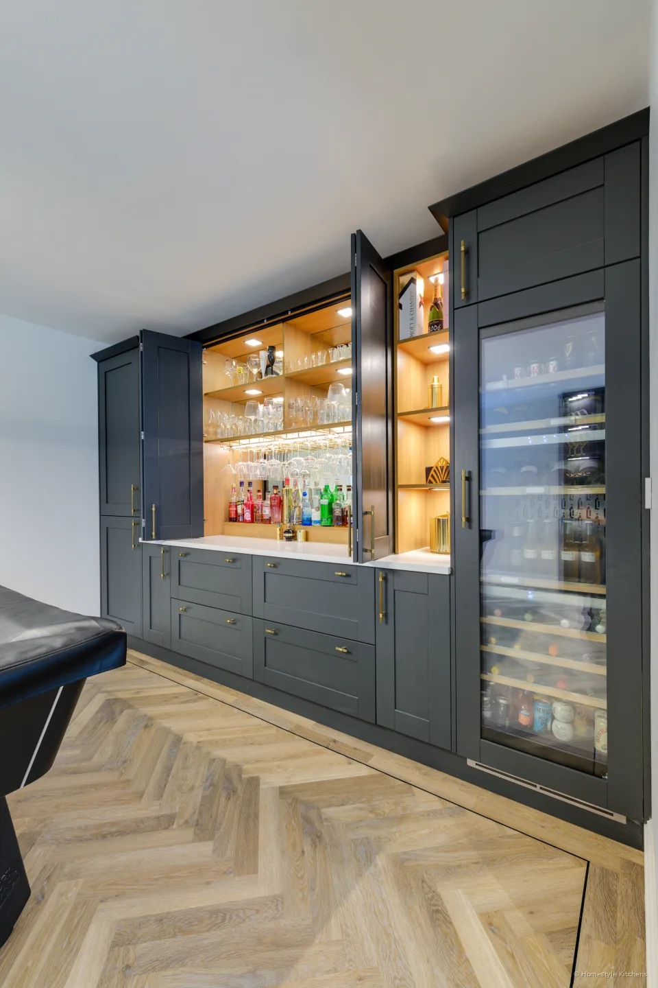 Dark shaker bar from the pool-table end, herringbone oak floor.